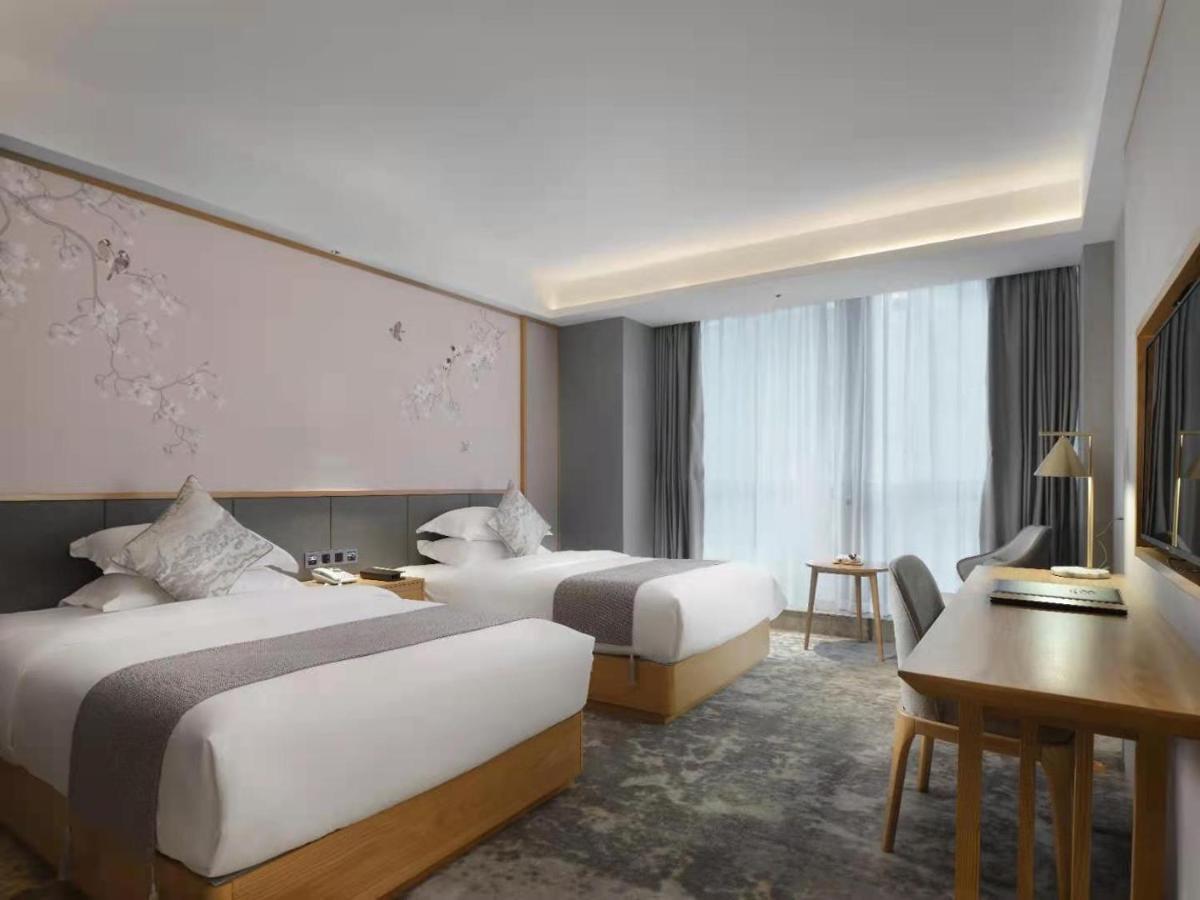 Baian Art Hotel Luzhou Exterior foto